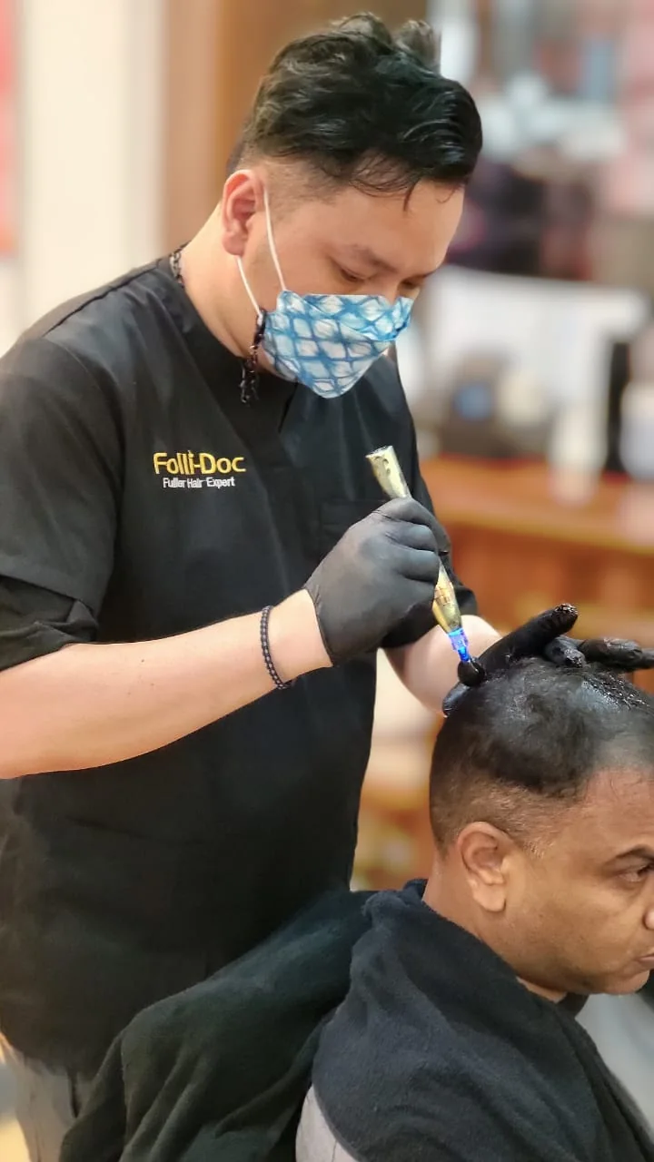 Cutting and styling a hair system to blend with the client's own hair